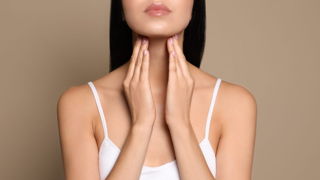 A woman concerned about swelling in her neck