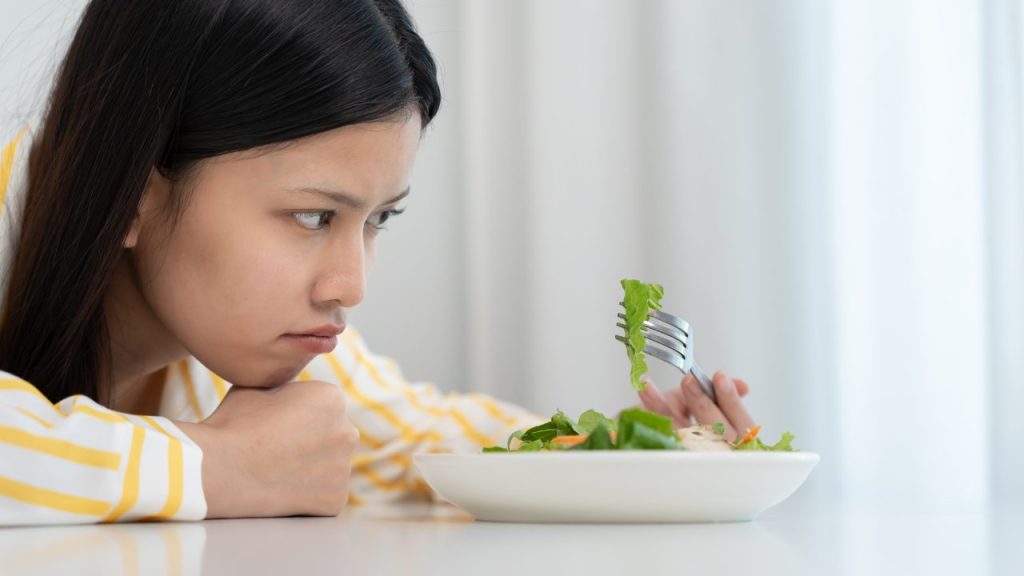 不調を抱えている女性